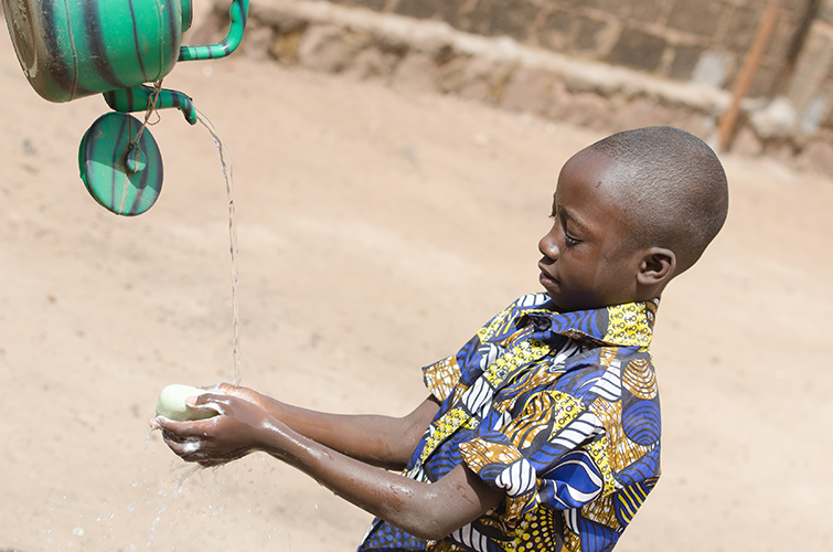 boy washing hands